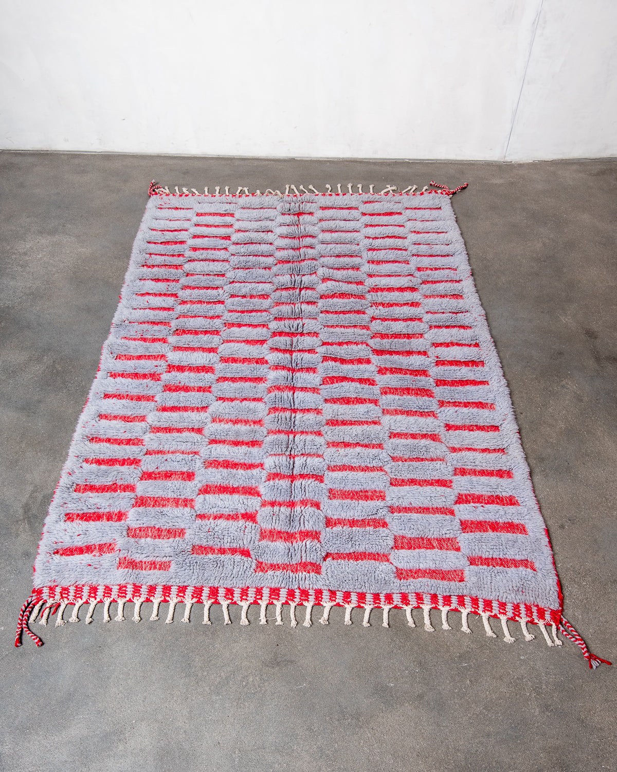 Modern, designer, handcrafted Berber rug from Morocco. Beniourain carpet with beautiful colours and patterns and fluffy wool texture.